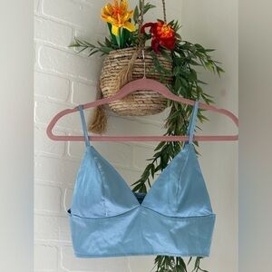 Bralette in Silky Blue Women’s Size Med. Adjustable straps and elastic back.